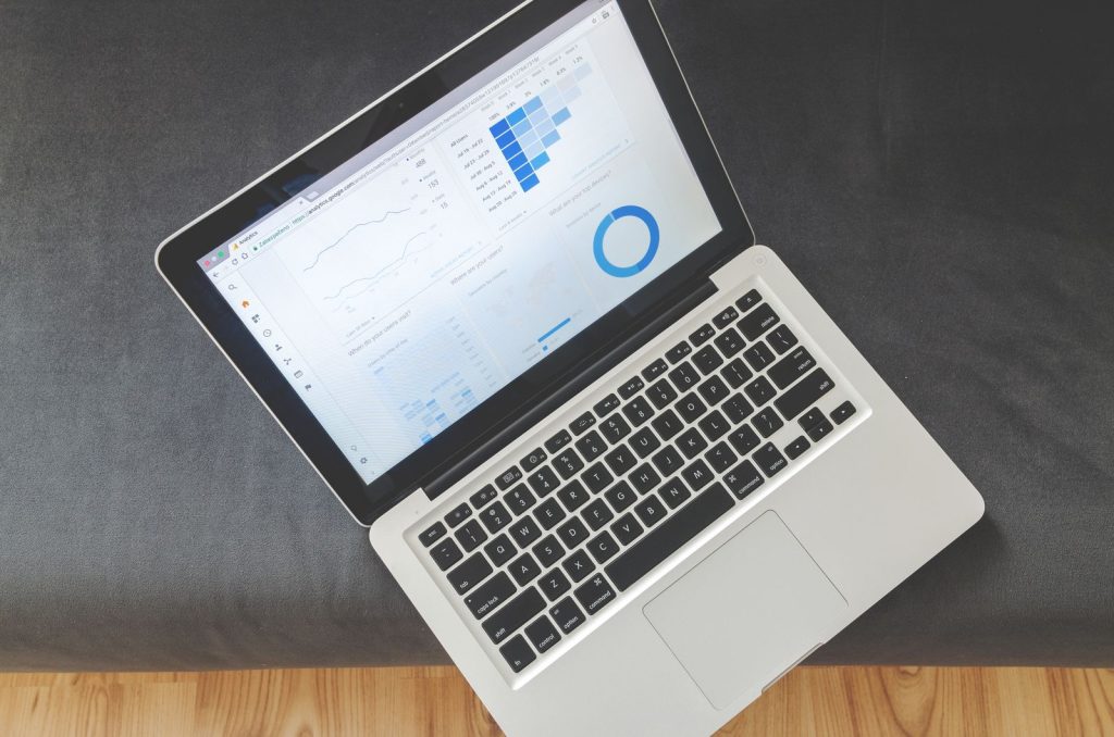 Laptop showing website analytics charts used to read heatmap data